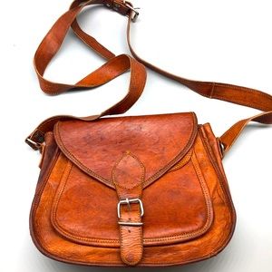 Vintage firm leather crossbody saddle bag